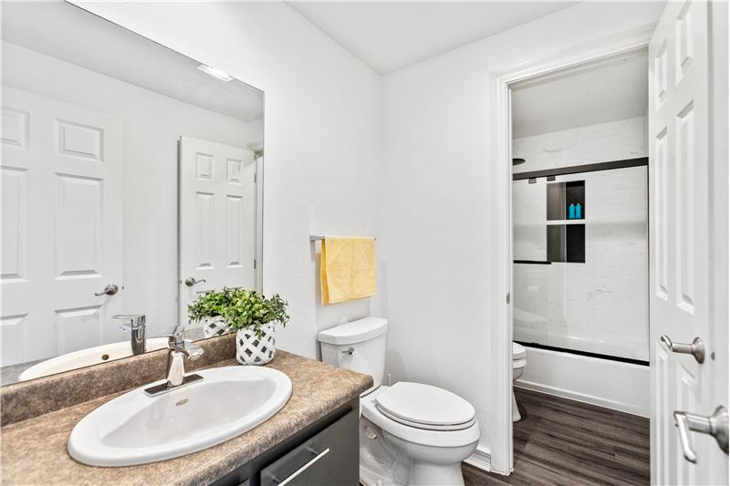 From hallway another glimpse at the half bath.