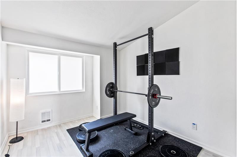 2nd bedroom, currently being used as a weight room. 2nd roommate, guest room or office?