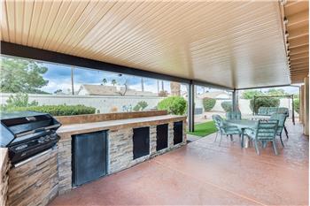 Covered patio wit grilling station and mister system