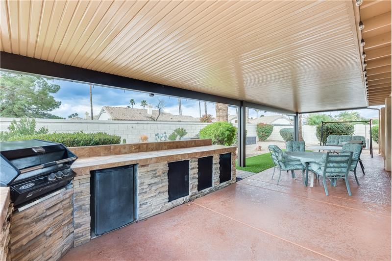 Covered patio wit grilling station and mister system