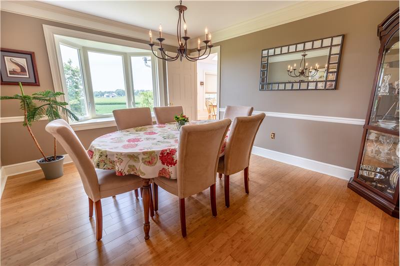 Bay window provides views of farmland & sunsets