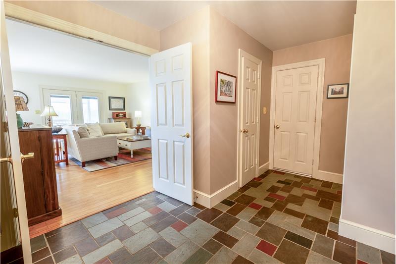 Foyer provides access to family & living rooms