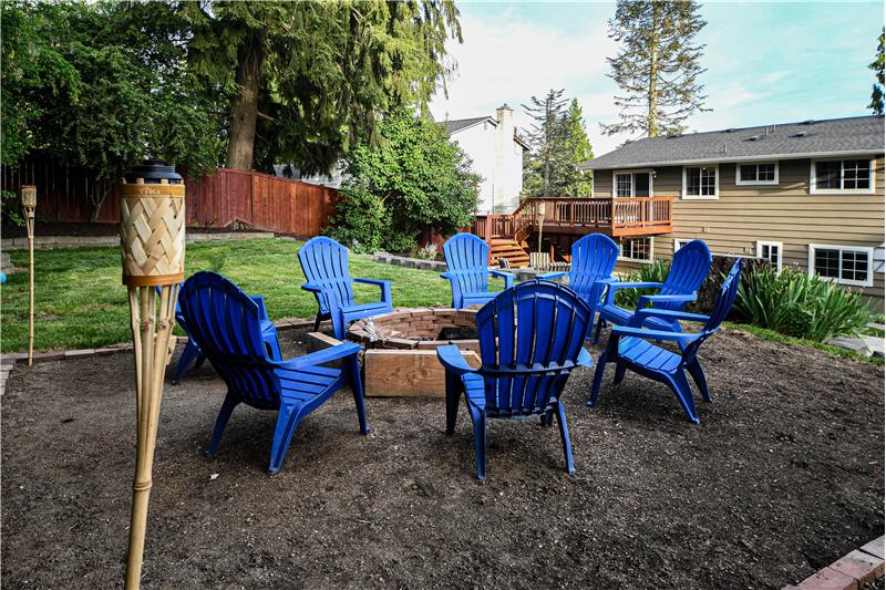 Upper tier backyard fire pit is great place to relax after a hard day.