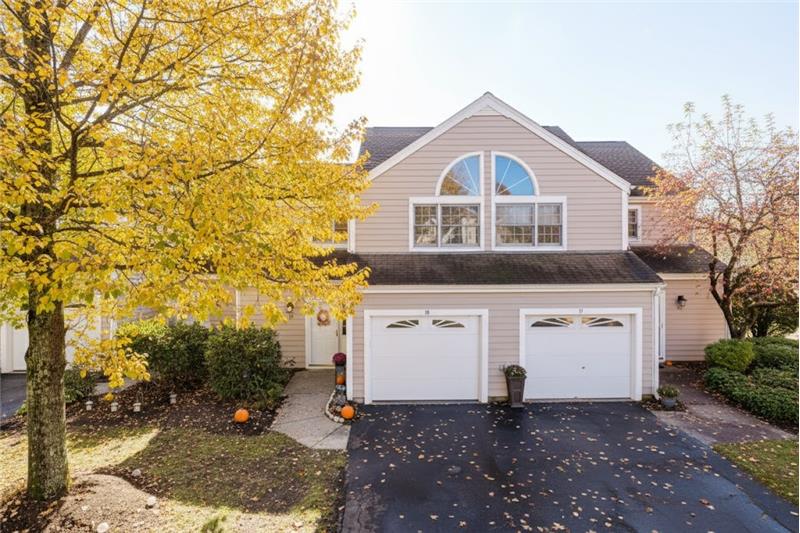 Frontal shot of the property located at 18 Teal Circle in Walpole Massachusetts