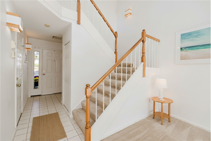 stairs leading up to the second floor at eighteen teal circle in walpole massachusetts
