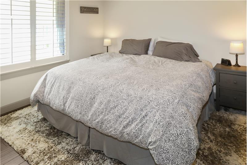 Lovely Master Bedroom with 3 inch Wood Shutters.