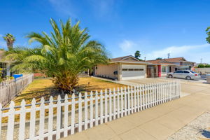 Idyllic White Picket Fencing in Front!