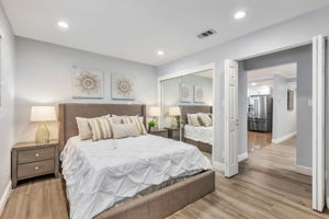 Primary Bedroom has Easy Access to Kitchen for a Midnight Snack!