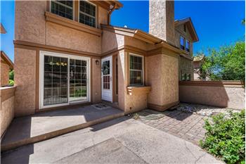Spacious front courtyard, ideal for outdoor dining, entertaining, and soaking up the Colorado sunshine.