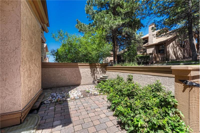 Paver patio in the front courtyard.