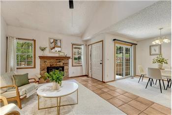 Bright, open floor plan with vaulted ceilings and lots of natural sunlight throughout the home.