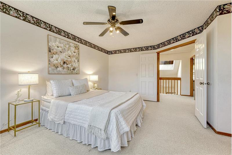 Upper level primary bedroom.
