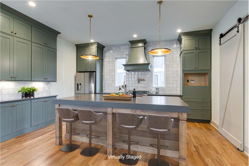 Tons of cabinets in this well-appointed kitchen