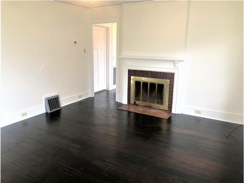 Orignal hardwood floors that have just been refinished! Freshly painted interior.
