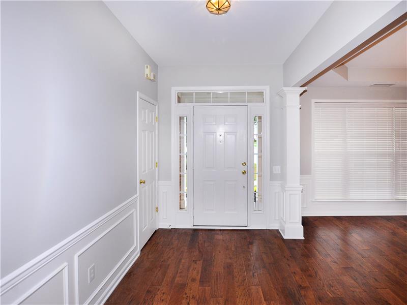 Entry with pretty moldings and columns
