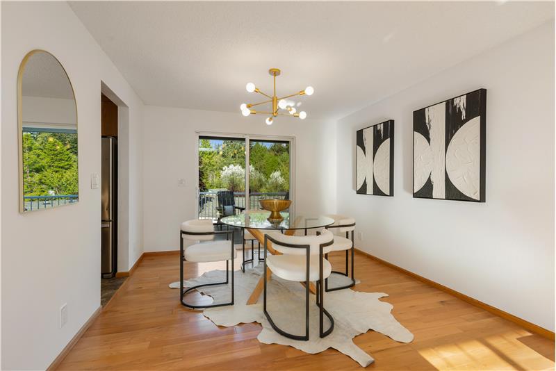 New modern light fixtures elevate the ambience of the dining room.