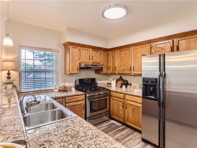 Recently updated appliances, sink and faucet. This kitchen is beautiful, well designed and an efficient use of space.