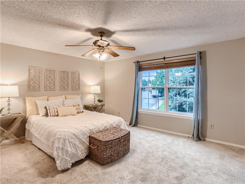 The primary bedroom is very large, bright and private.