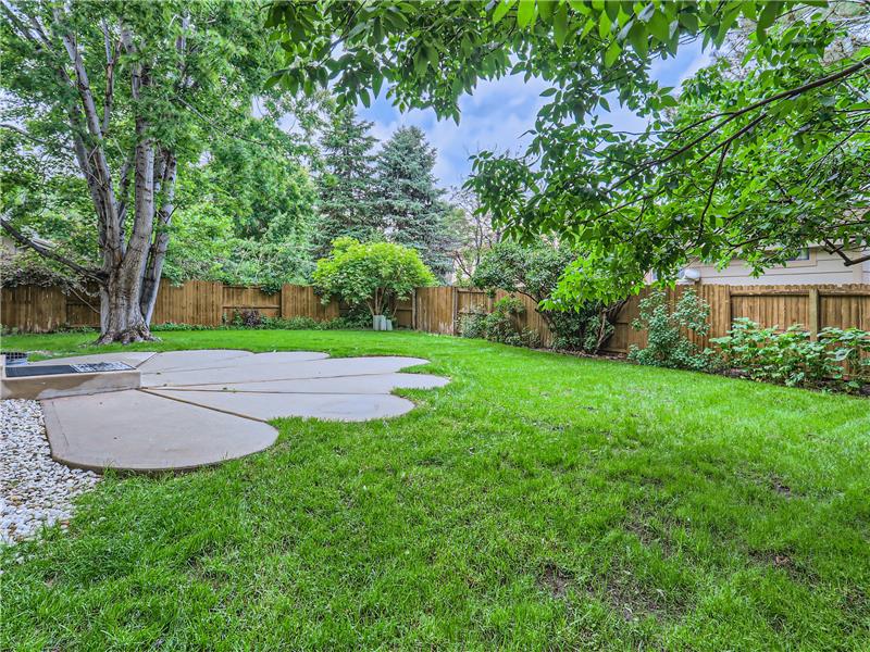 Another angle of the large yard oasis, with lots of opportunity to either expand garden beds, or just enjoy the dappled light fr
