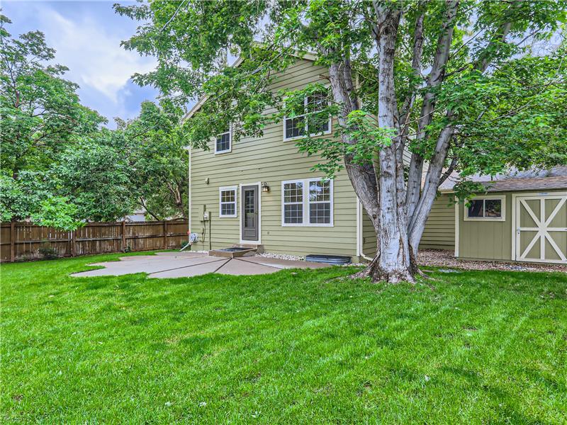 Extending off the dining and kitchen area, this backyard provides the opportunity to relax while still keeping an eye on any chi