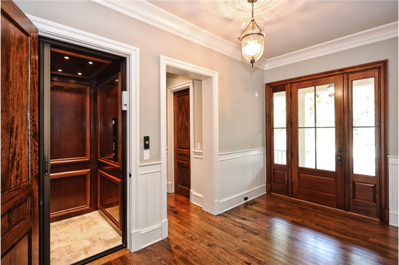 Mahogany elevator cab in foyer