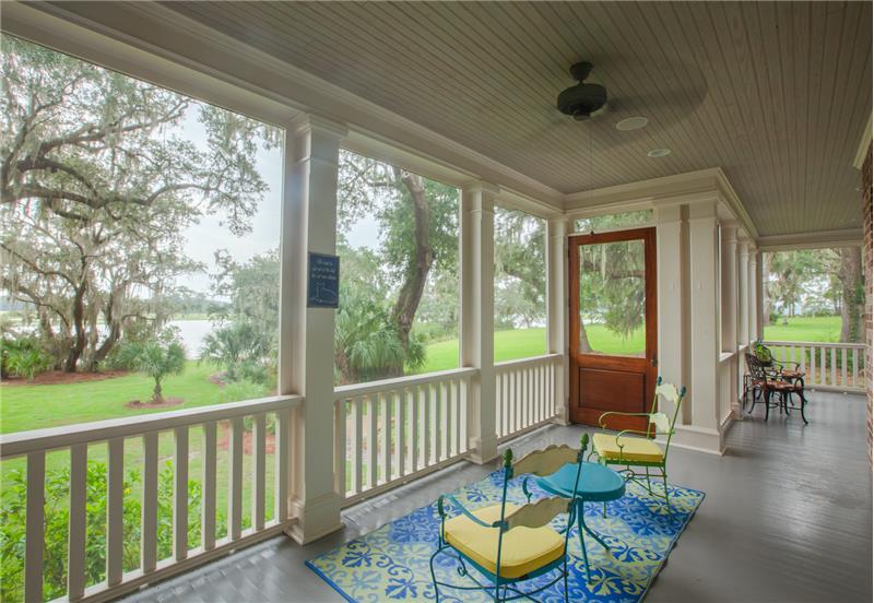 One section of screened porch looking towards dock