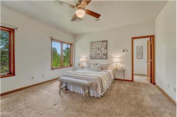 Primary bedroom is on the main level with adjoining bath.