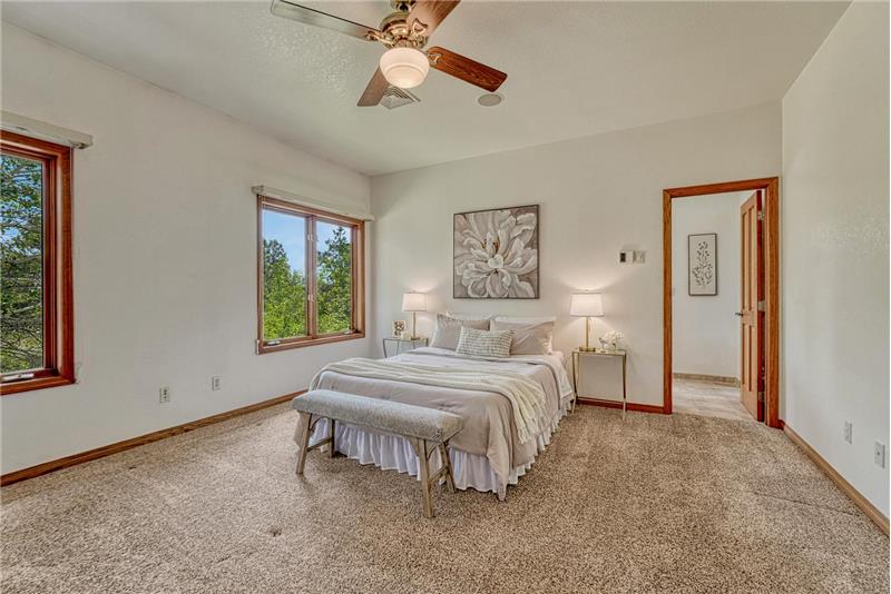 Primary bedroom is on the main level with adjoining bath.