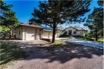 A heated 3-car garage  w/service door and utility sink plus a separate 20x30 RV garage.