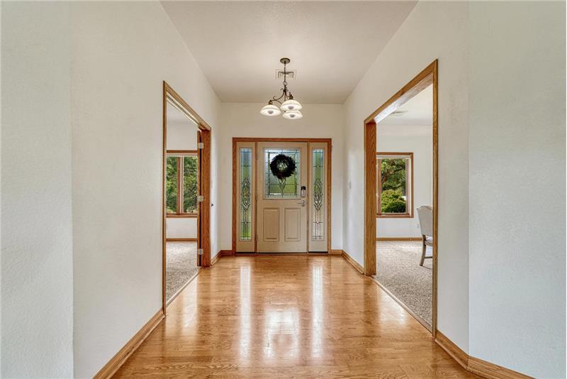 Back inside:  hardwood flooring continues through the entry, kitchen and great room.