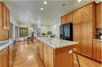 Beautiful wood cabinetry with granite countertops.