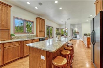Kitchen opens to the breakfast nook and living room.  Window over kitchen sink!