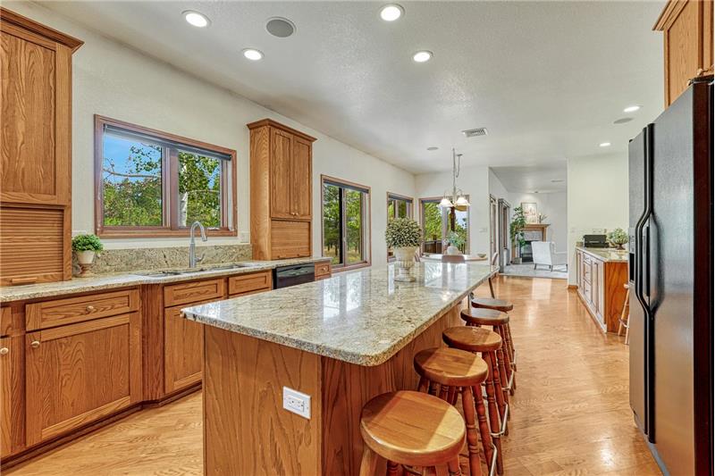Kitchen opens to the breakfast nook and living room.  Window over kitchen sink!