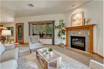 Great Room with welcoming fireplace for chilly Colorado evenings.