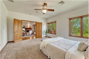 Primary bedroom easily fits a King size bed!