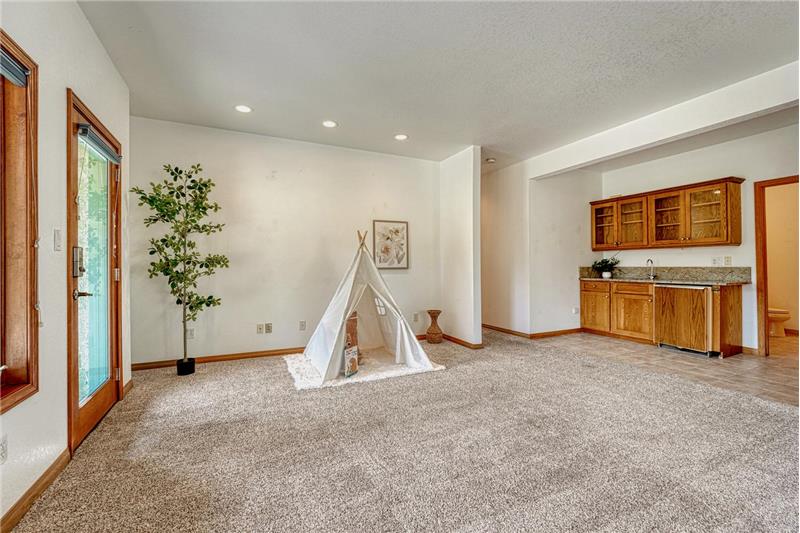 Rec room walks out to the covered patio.