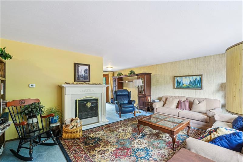 Electric fireplace in living room is included