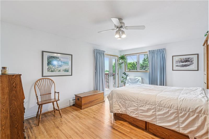 Primary bedroom has its own deck with view of Table Mountains