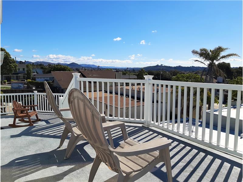 The decking created as part of this homes massive expansion is equally impressive with views past Huasna to the Temblor Range!!