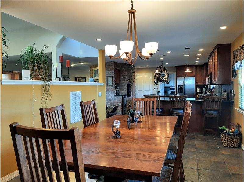 Nice. A dining room design that Actually Encourages cross-room talk and family banter!