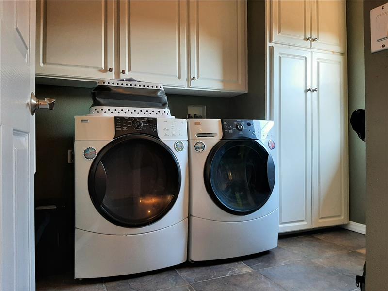 Floor length cabinets in the laundry is nice, but so is the (not pictured) floor length hanging dowel for clothes out the dryer!