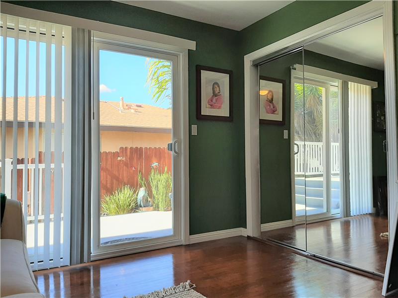 Bedroom 3 enjoys a private entrance and mirrored closet doors!