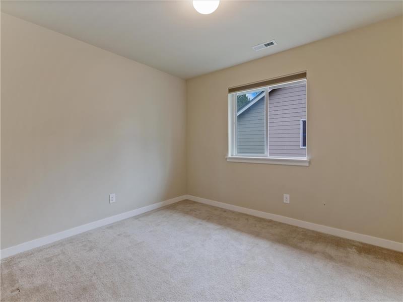 2nd of the 3 bedrooms.