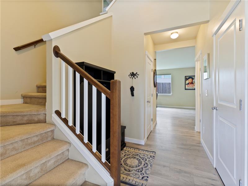 Entry way - forward is your main living area. Stairs to left lead up to 4 bedrooms.