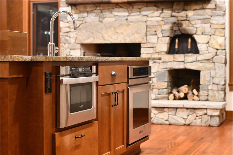 Prep sink, built-in microwave, brand new Dacor electric oven (yes there are TWO ovens in this kitchen).