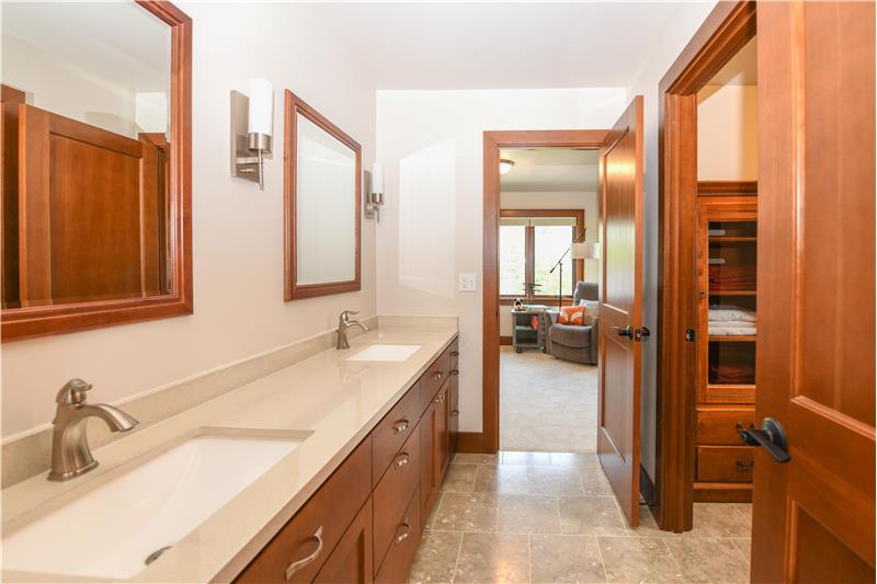 Jack and Jill bathroom with lavatory to the right.