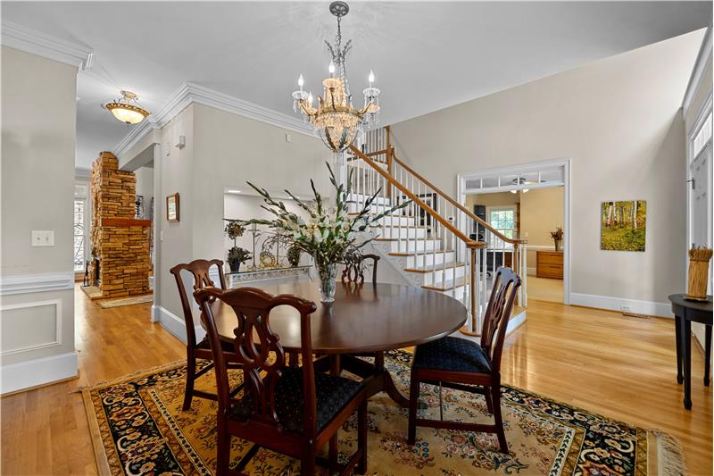 Dining room has open sight lines to the foyer and easy access to the kitchen.