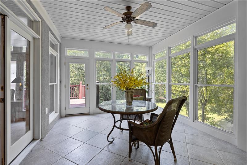 Spacious sunroom accessed from the great room and the home office.
