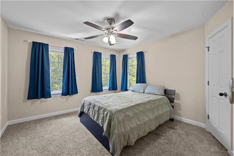 One of three additional bedrooms on second floor of home.