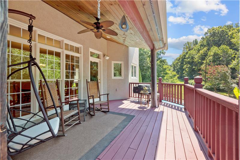 Expansive deck provides space for outdoor living and entertaining.
